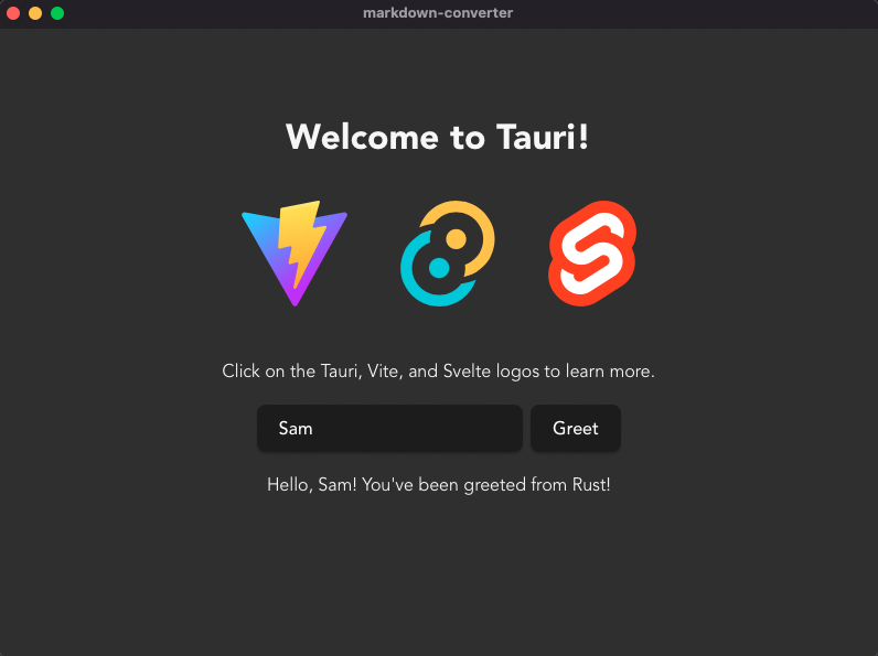 Desktop application showing welcome to Tauri in white text and three icons